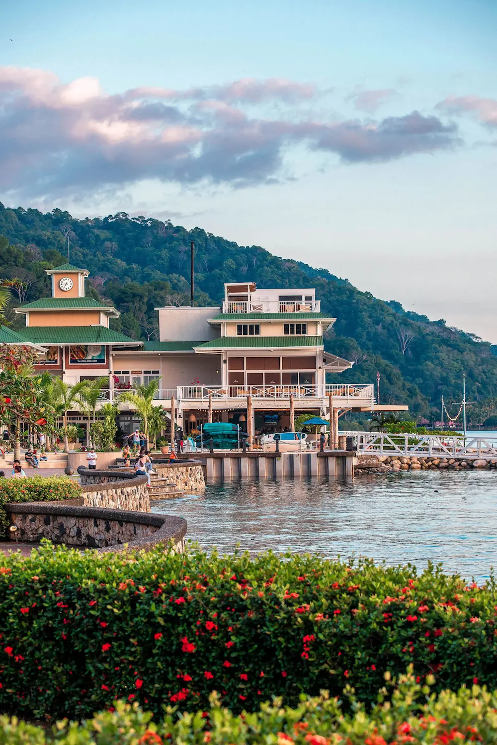 Marina Village promenade with palms and residences
